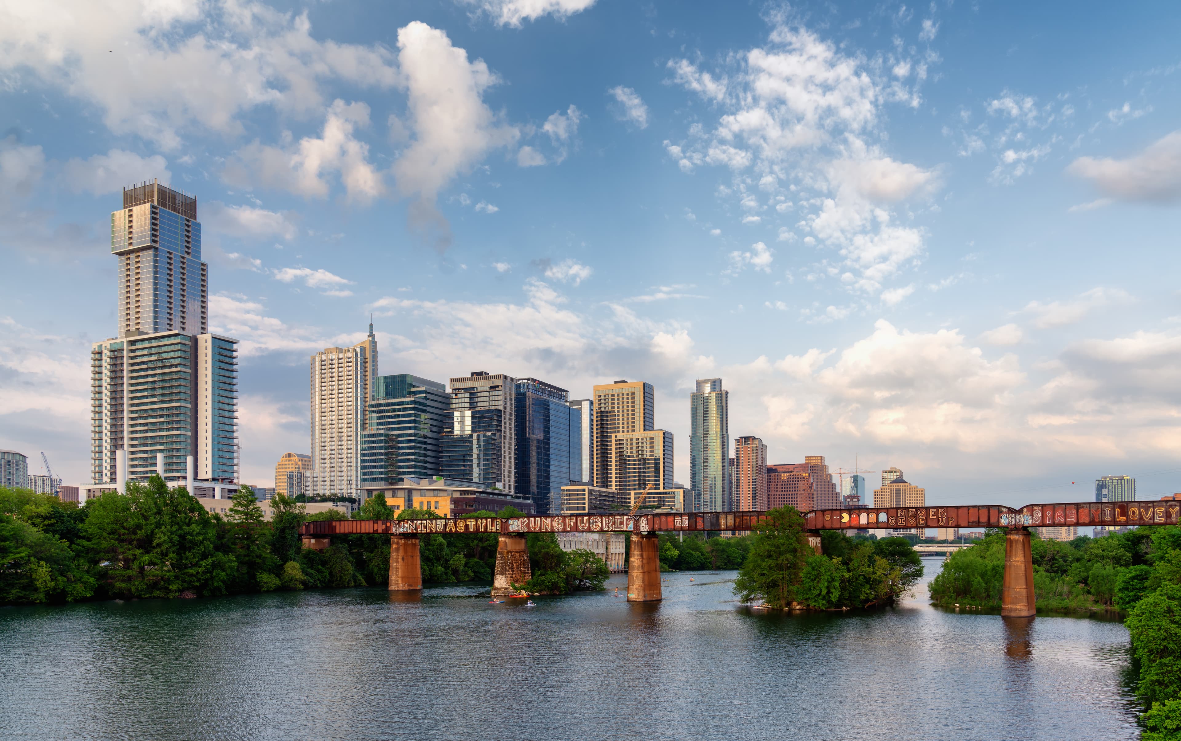 Austin skyline with downtown buildings and Colorado River.