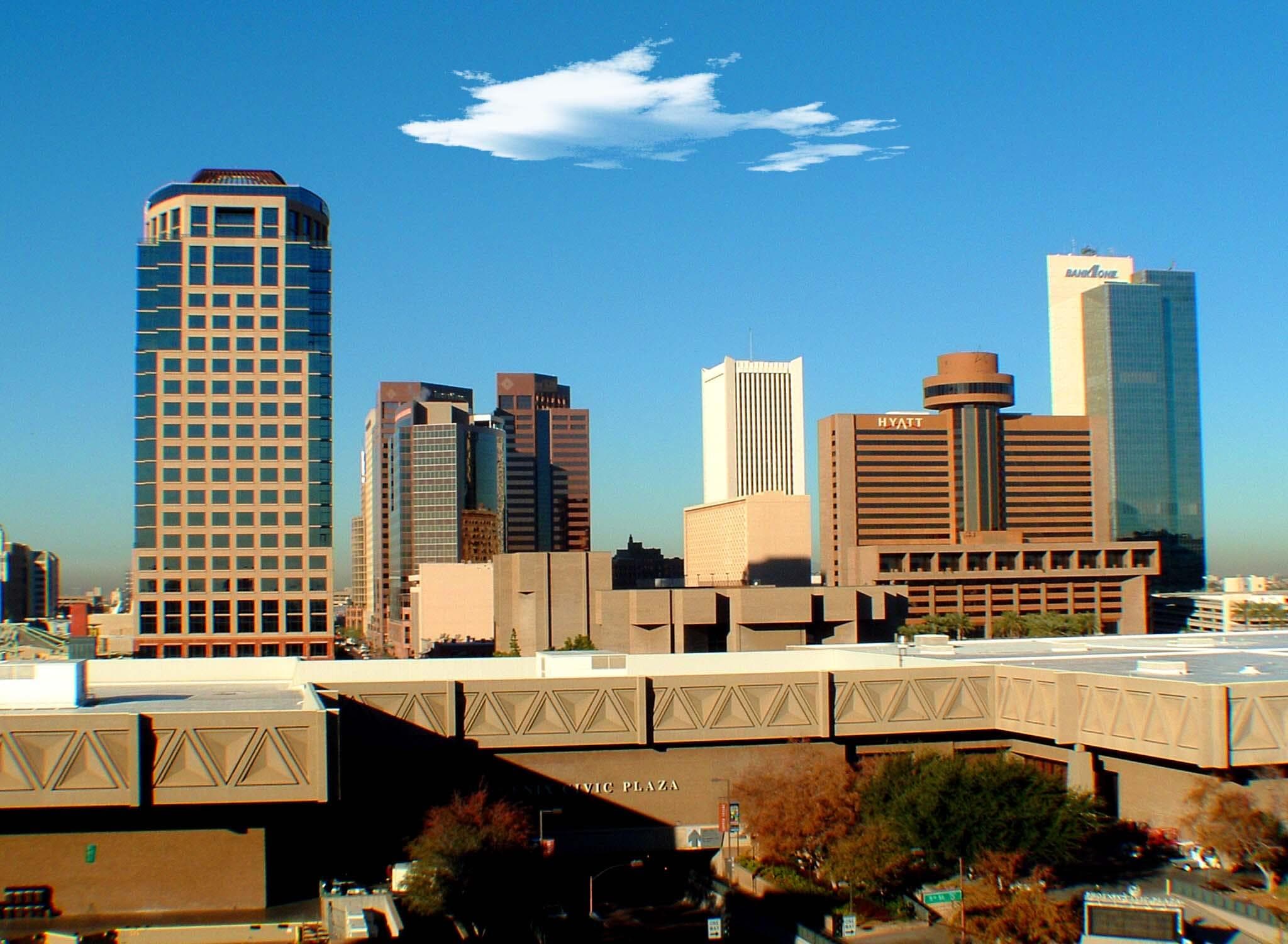 Phoenix desert and city skyline at dusk.