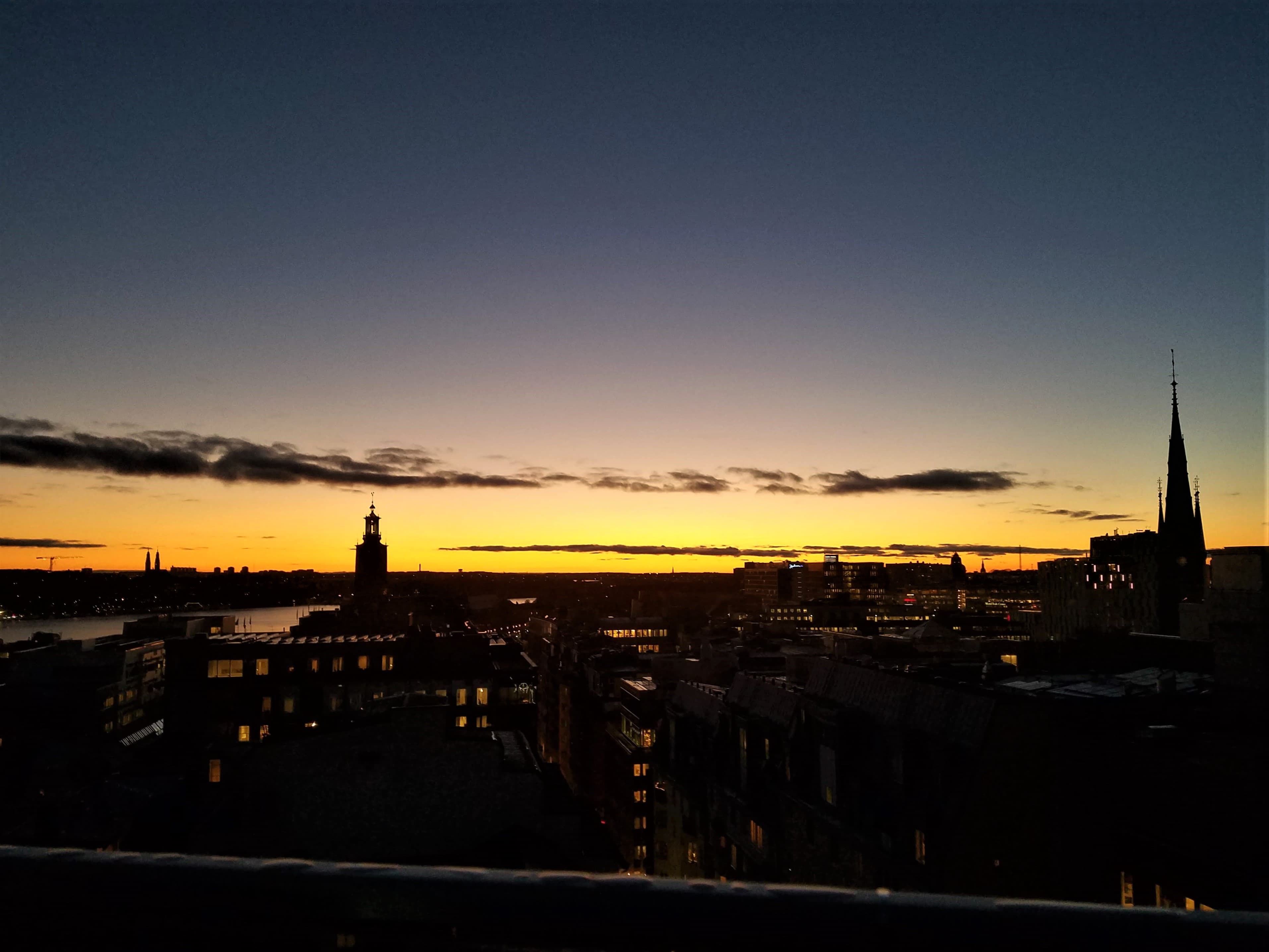 Stockholm skyline with waterfront buildings.