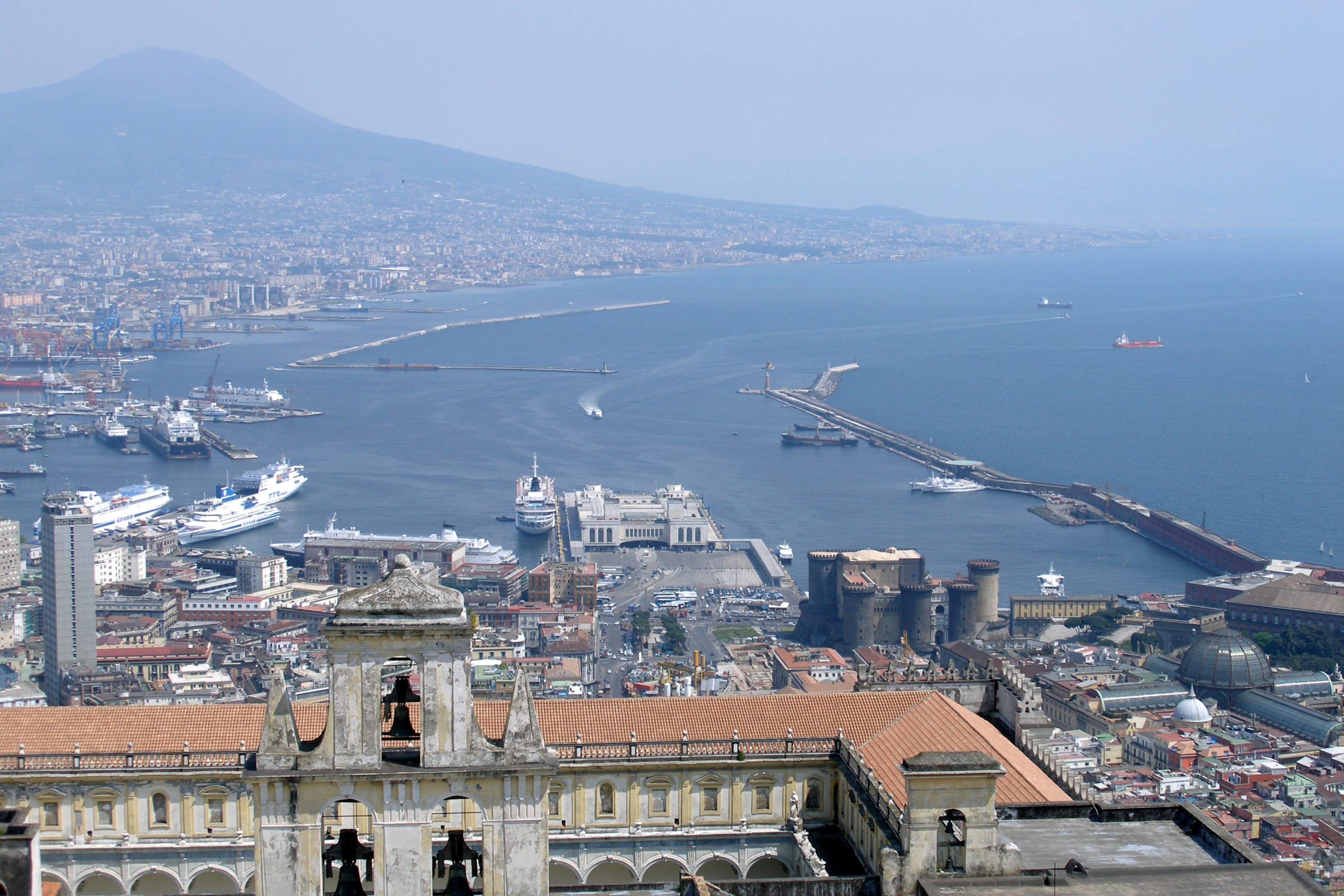 Naples waterfront with Mount Vesuvius in the distance.